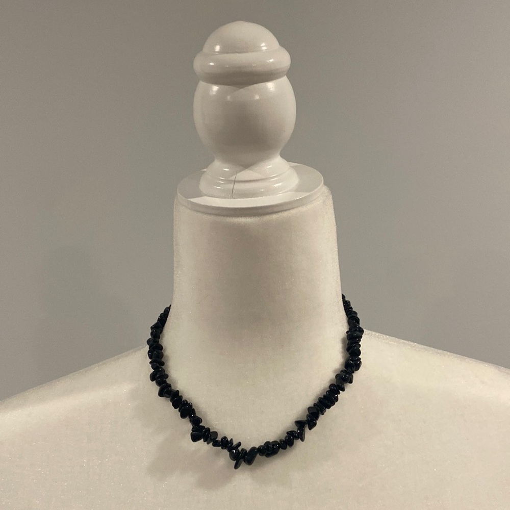 ☀️ Black beaded necklace with matching earrings.